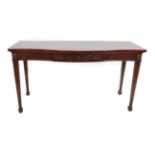 A George III Mahogany Serpentine Shaped Serving Table, late 18th century, the fluted cornice centred