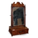 ~ An Early 18th Century Figured Walnut and Featherbanded Dressing Mirror, the mercury plate within