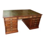 A George III Style Partners Desk, late 19th/early 20th century, with a green leather writing surface