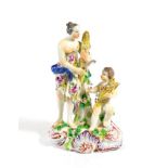 A Bow Porcelain Figure Group of Summer, circa 1765, modelled as a classical maiden holding a sheaf