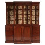 A Late George III Mahogany Library Bookcase, early 19th century, the dentil cornice above four