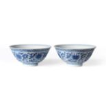A Pair of Chinese Porcelain Bowls, with slightly everted rims, painted in underglaze blue with