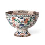 A Cantagalli Faience Bowl, circa 1900, painted in Isnik style with stylised tulips and other flowers