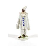 A Meissen Porcelain Figure of Pierrot, 20th century, standing wearing a mask and white robes with