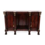 A Regency Mahogany and Brass Mounted Breakfront Dwarf Bookcase, with carved border and two