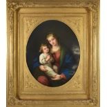 A German Porcelain Plaque, circa 1860, of oval form, painted with the Madonna and Child, 42cm by