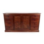 A Gillows of Lancaster Mahogany and Figured Walnut Dwarf Linen Press, third quarter 19th century,