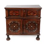 An Oak Parquetry Decorated and Ivory Mounted Chest of Drawers, circa 1680,in two sections, the