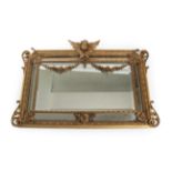 A Victorian Gilt and Gesso Overmantel Mirror, 3rd quarter 19th century, the rectangular bevelled