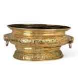 A Dutch Brass Wine Cistern, late 17th/early 18th century, of oval form with everted rim and lion