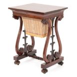 An Early Victorian Rosewood Work Table, mid 19th century, the hinged lid enclosing compartments