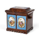 A Victorian Sèvres Style Porcelain Mounted Rosewood Work/Writing Table Cabinet, the hinged top set