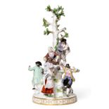 A Meissen Porcelain Figure Group, late 19th century, modelled as peasants in 18th century dress,