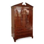 ~ A George III Mahogany and Satinwood Banded Linen Press, early 19th century, the dentil and