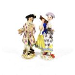 A Matched Pair of Meissen Porcelain Figures of Singers, 20th century, both in 18th century costume