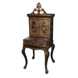 A 19th Century Chinese Export Black Lacquered and Gilt Decorated Cabinet, richly decorated