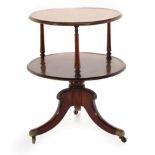~ A George IV Mahogany Two-Tier Dumb Waiter, circa 1825, of circular moulded form with three
