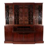 A Late George III Mahogany and Ebony Strung Breakfront Library Bookcase, early 19th century, in