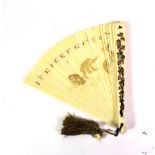 A Japanese Ivory and Shibayama Fan, Meiji period, the sticks carved in low relief and partially