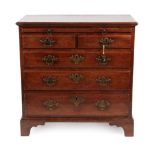 A George III Mahogany Bachelor's Chest, late 18th century, with pull-out brushing slide above two