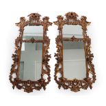 A Pair of Early 20th Century Carved Giltwood Chippendale Revival Pier Glasses, the mercury mirror
