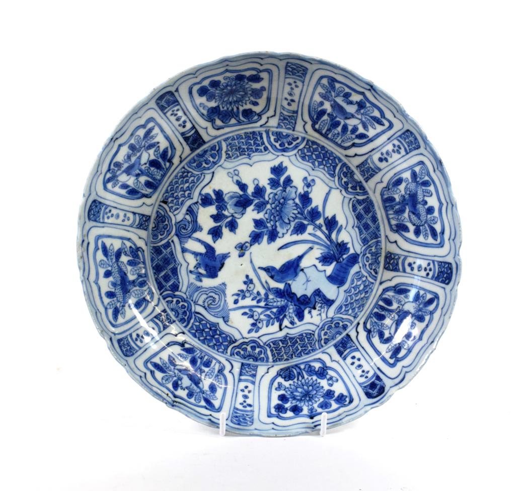 A Chinese Porcelain Saucer Dish, Wanli period, typically painted in underglaze blue with birds