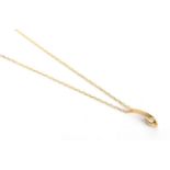 An 18 carat gold diamond pendant on an 18 carat gold chain, pendant length 1.9cm, chain length