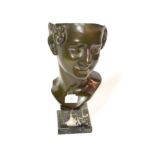 ^ A 20th century bronze bust in the form of a female's head, 35cm high