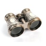 A pair of late Victorian of silver mounted binoculars, Barnett Henry Abrahams, Birmingham 1891, with