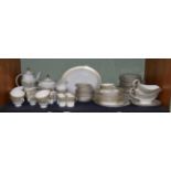 A Royal Doulton 'English Renaissance' pattern dinner service for ten place settings