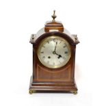A mahogany inlaid striking mantel clock, retailed Ollivant & Botsford, Manchester; together with