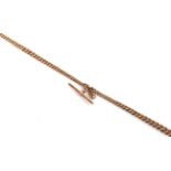 A graduated Albert chain, each link stamped '9' '.375', with a 9 carat gold T-bar . Gross weight -