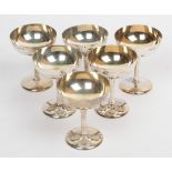 A set of six silver champagne saucers, Walker & Hall, Sheffield 1913, 10.5cm high, 19.9ozt (6)