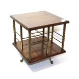 ^ A late Victorian oak and brass revolving bookstand, 32cm high