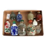 Peking glass snuff bottles, two interior painted; and three others