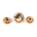 A 9 carat gold citrine dress ring, finger size M; and a pair of citrine earrings, stamped '9CT',