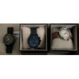 A Time Tide-Compass-Temp wristwatch, a Timex chronograph wristwatch, and a Timex indiglo Tide-