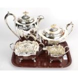 A plated four-piece tea service, with mother of pearl finials and ivory insulators, the hot water