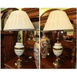 ^ A large pair of brass and ceramic table lamps with shades, 88cm high