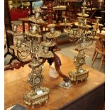 ^ A pair of gilt metal eight branch candelabra in the Adams style