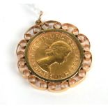 A 1958 sovereign loose mounted as a pendant. Gross weight 10.38 grams