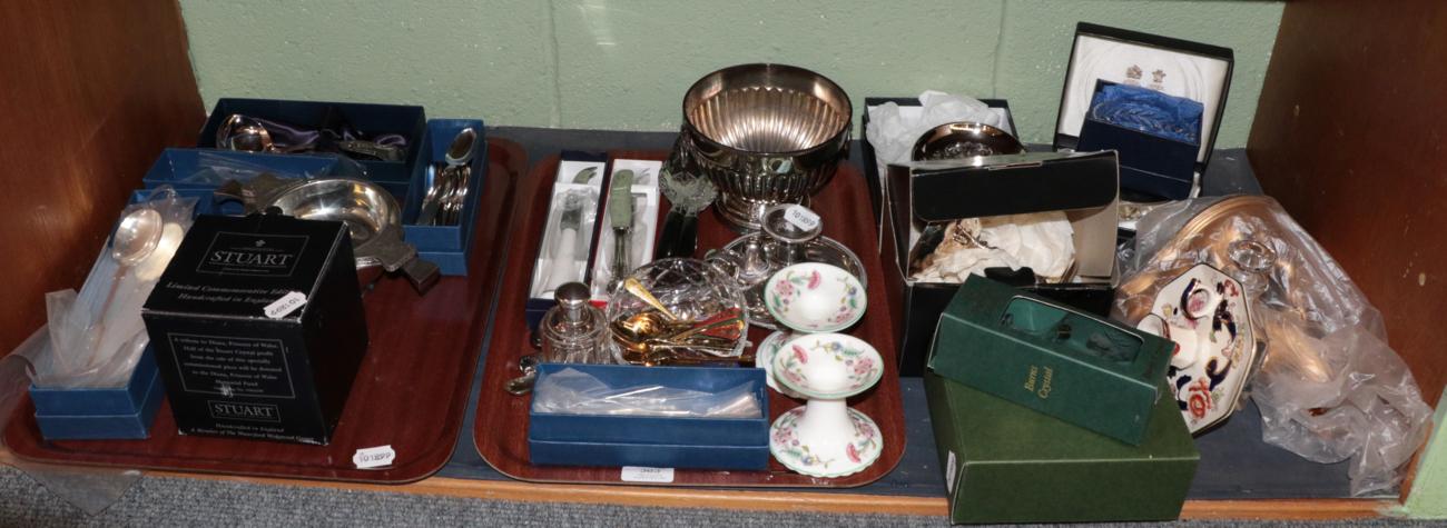 A shelf of silver plated cutlery; a chamber stick; pedestal bowl; Masons Mandalay candlestick;