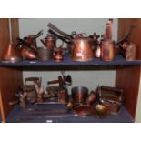 ^ Two shelves of 19th century and later copper kitchenalia