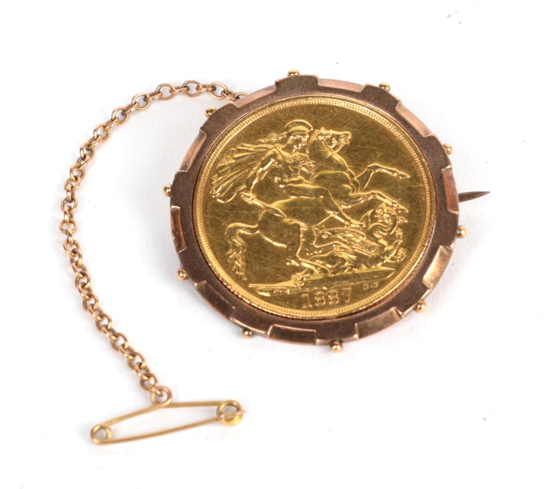 An 1887 two pound coin in a brooch mount . Gross weight 22.20 grams.