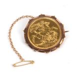 An 1887 two pound coin in a brooch mount . Gross weight 22.20 grams.