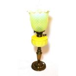 ^ A late Victorian brass oil lamp with yellow glass reservoir and green vaseline glass shade, height