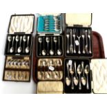 Six cased sets of silver teaspoons and a cased set of silver forks