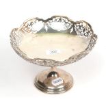 A silver pedestal bowl, Walker & Hall, Sheffield 1922, with foliate pierced border and shaped rim,