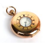 A 9 carat gold half hunter pocket watch, retailed by Armstrong, Manchester