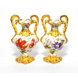 ^ A pair of 19th century gilded twin-handled vases decorated withy butterflies and flowers, 23cm